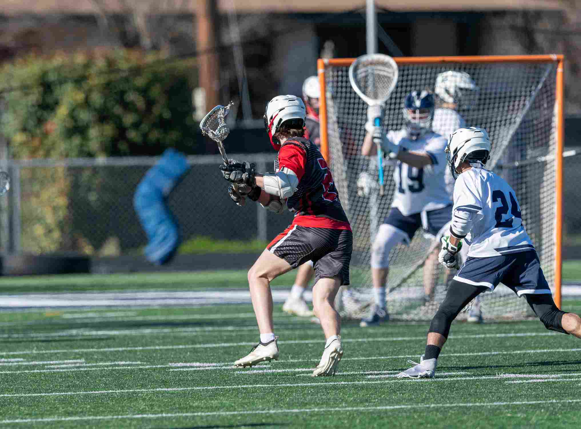 Patrick Tighe's son playing lacrosse