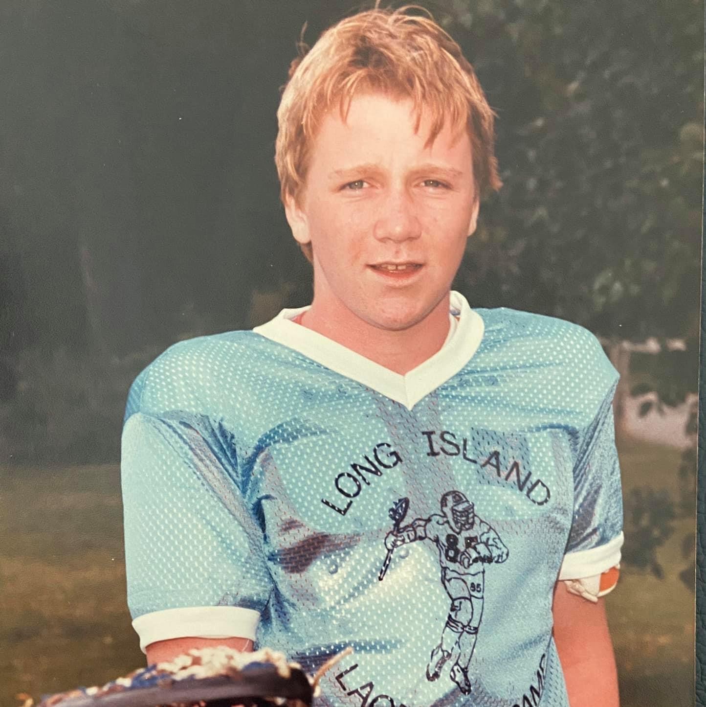 a young Patrick Tighe in a lacrosse jersey